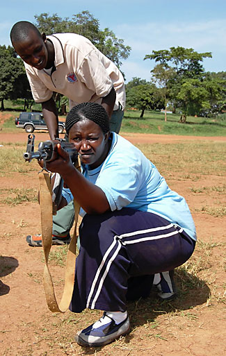 Looking for opportunity: Ugandan recruits hoping to work as private security guards in Iraq undergo basic firearms training in Kampala, Uganda, Dec. 15 2008, Max Delany